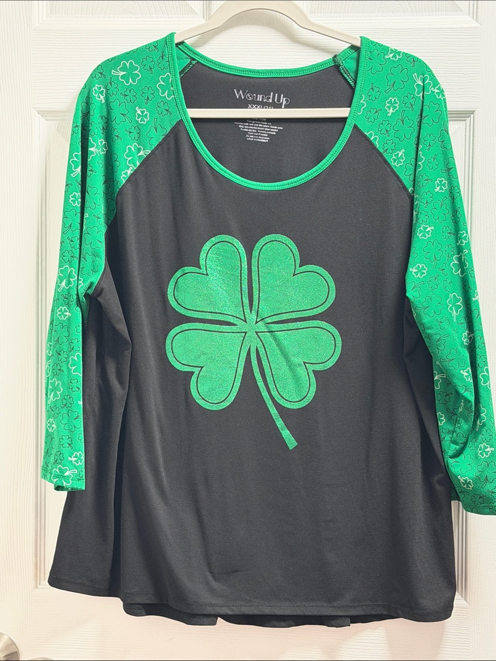 Wound Up Black Long-Sleeve Tee with Green Clover Graphic